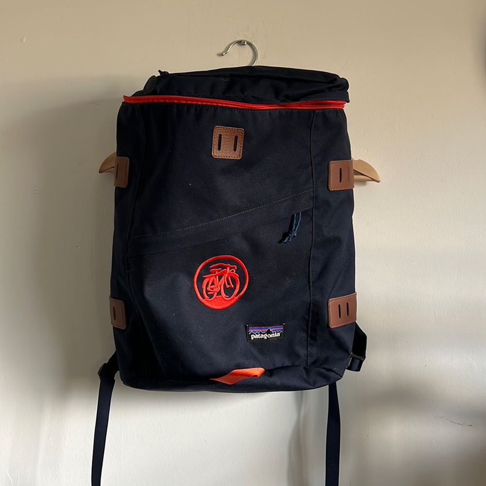Patagonia Toromino 22L backpack. Navy with red details